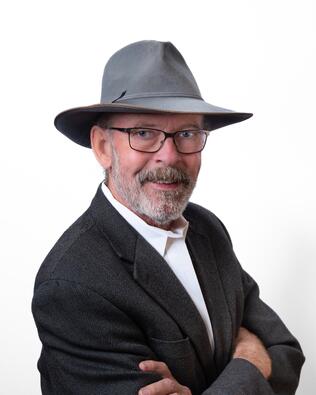 Headshot of Mark Hughes