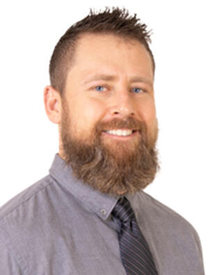 Headshot of Adam Harness