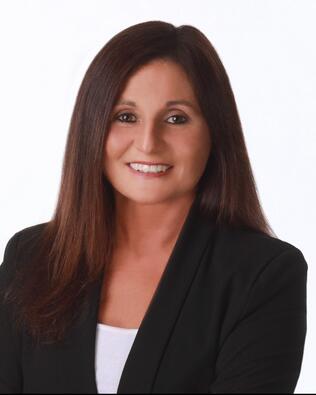 Headshot of Mina Harman