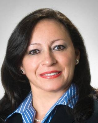Headshot of Olga Cancio