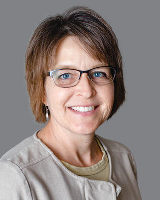 Headshot of Cheryl Lustig