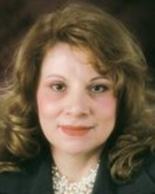 Headshot of Maggie Woda