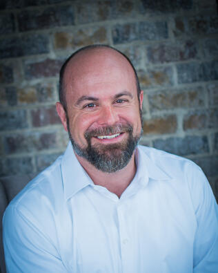 Headshot of Kirk Driskell