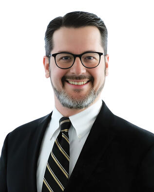Headshot of Damon Duck