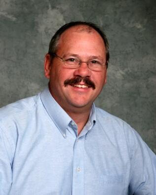 Headshot of Owen Burgess