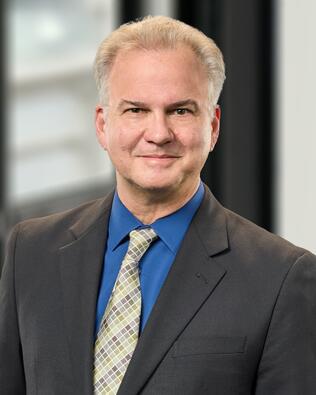 Headshot of Daniel Coggins