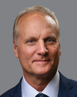 Headshot of John Sakry