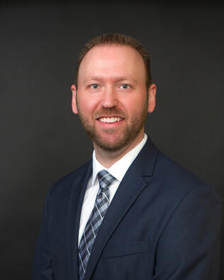 Headshot of Brett Steinberg