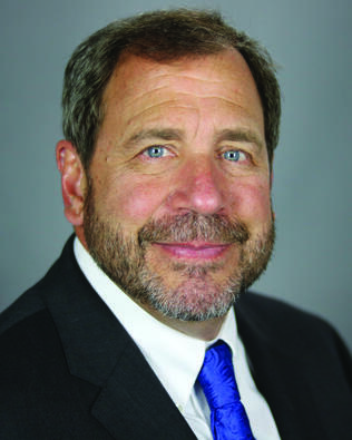 Headshot of MICHAEL MUNDEW