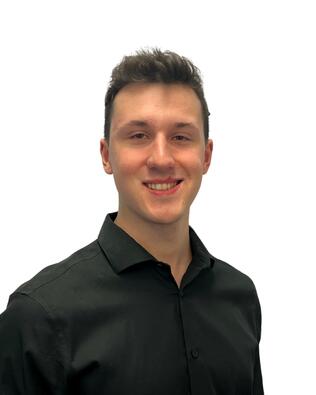 Headshot of Jake Thomas