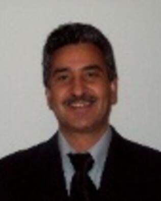 Headshot of RAYMUNDO CABRALES
