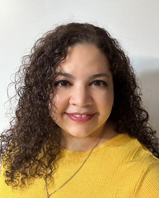 Headshot of Rosangie DelValle
