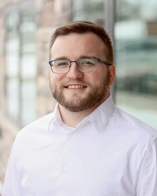 Headshot of Clayton Happel