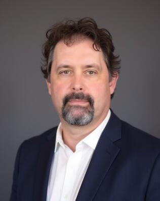 Headshot of Wayne Mostad