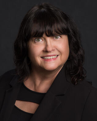 Headshot of Susan Daniels REALTOR®