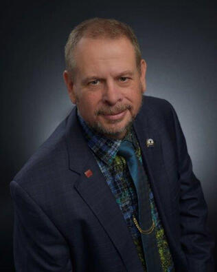 Headshot of Gary . Schraut