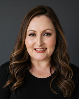 Headshot of Cristina Arvayo