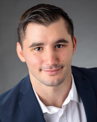 Headshot of John "Jack" Reina