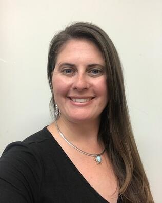Headshot of REBECCA LEWIS