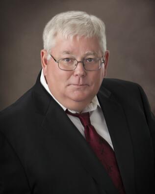 Headshot of Skip Rice