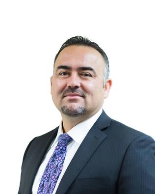 Headshot of Al Ayubi