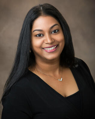 Headshot of Santhi Omagandam
