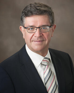 Headshot of Michael Falcone