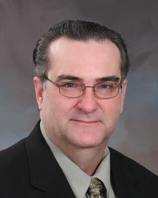 Headshot of Robert Hewey
