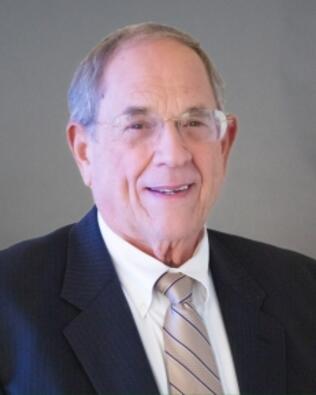 Headshot of Roger F Dolanch