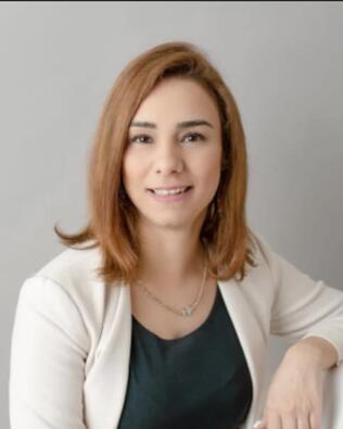 Headshot of Nil Civelek