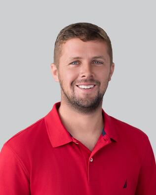 Headshot of ALEX BREAUX