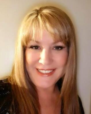 Headshot of Beverly Delucchi