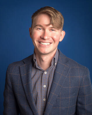 Headshot of Jake Rhodes