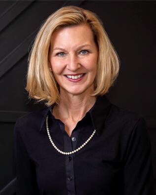 Headshot of Janeen Reigle