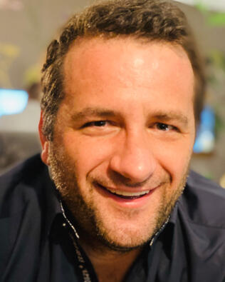 Headshot of Alex Rozwadowski
