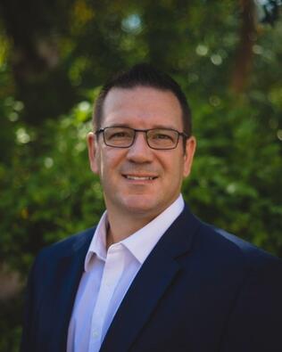 Headshot of David Acamovic Jr