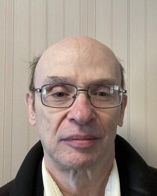 Headshot of Arnold Goldspiel