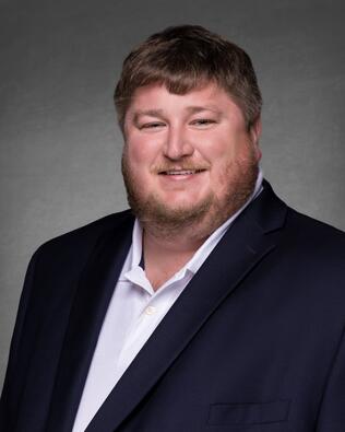 Headshot of Clay Revelle