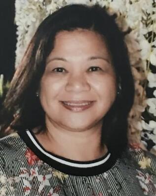 Headshot of Nelia A. Alimboyoguen