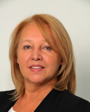 Headshot of Raymonda Tomasosky
