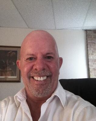 Headshot of Darvi Emenheiser