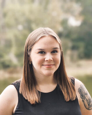 Headshot of Eliza Thrasher