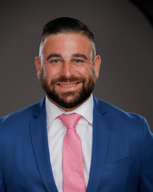 Headshot of Christopher Godson