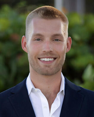 Headshot of Adam Kutchmire