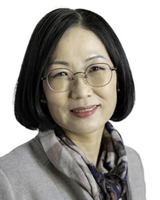 Headshot of June Kim