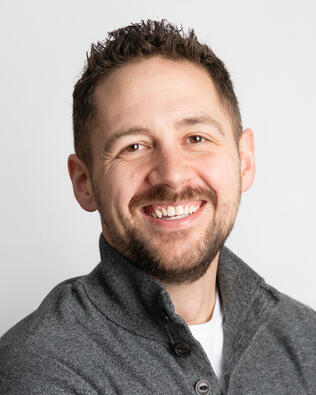 Headshot of Aaron Chandler