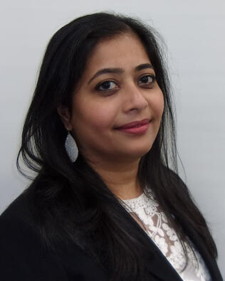 Headshot of Manju Ravi-Sharma
