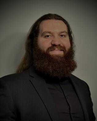 Headshot of Adam Miller