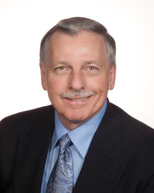 Headshot of Mark Malcolm