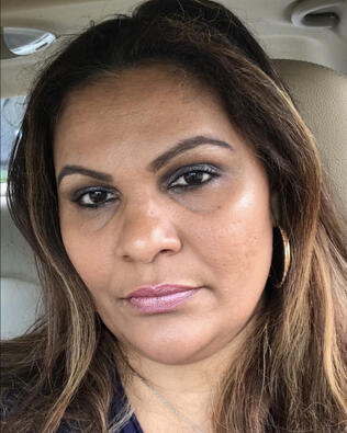 Headshot of Shivmattie Singh
